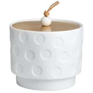 Petite boîte en porcelaine avec un couvercle en laiton massif. Le bouton du couvercle est une petite perle sur un lien en cuir. 